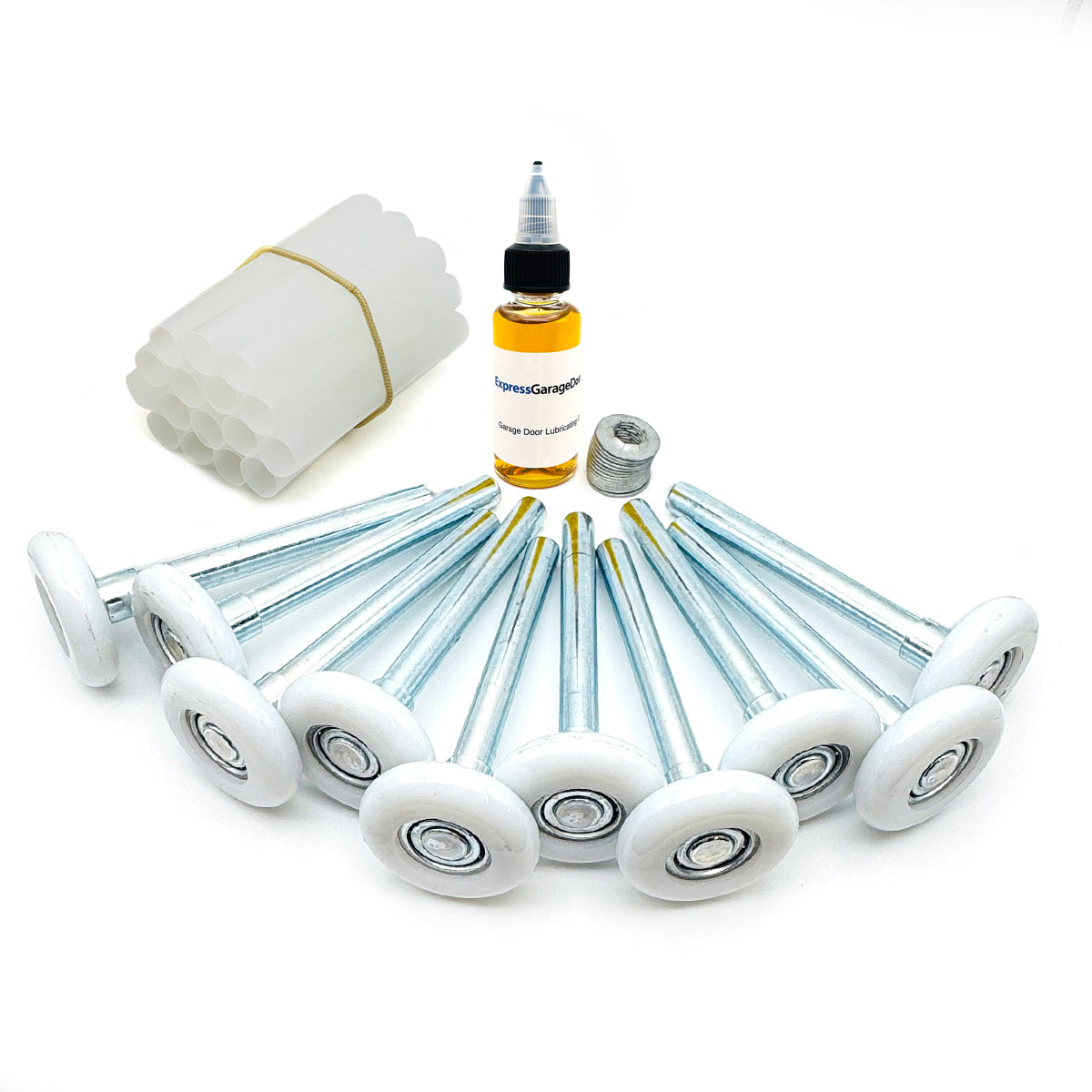 Set of door rollers, lubricant, and a small bottle on a white background