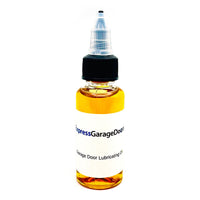 Bottle of garage door lubricating oil with a white background