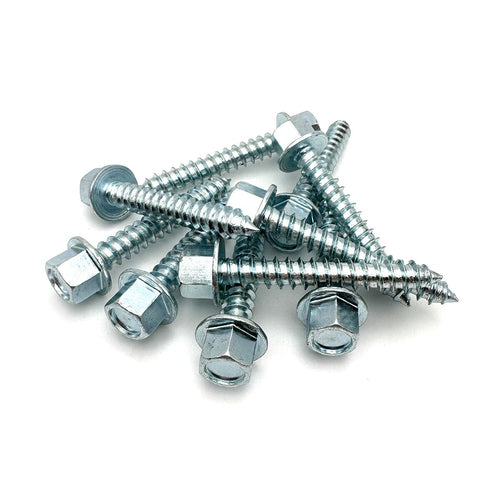Several zinc lag screws with 7/16'' hex heads scattered loosely