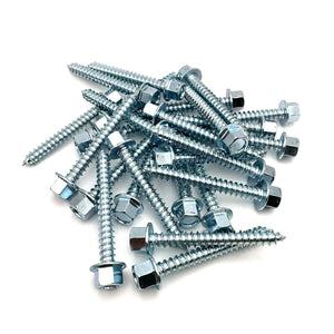Pile of zinc-plated lag screws, 5/16-9 x 2 1/2'', showcasing the quantity and consistent manufacturing.