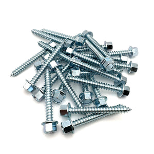 Pile of zinc-plated lag screws, 5/16-9 x 2 1/2'', showcasing the quantity and consistent manufacturing.